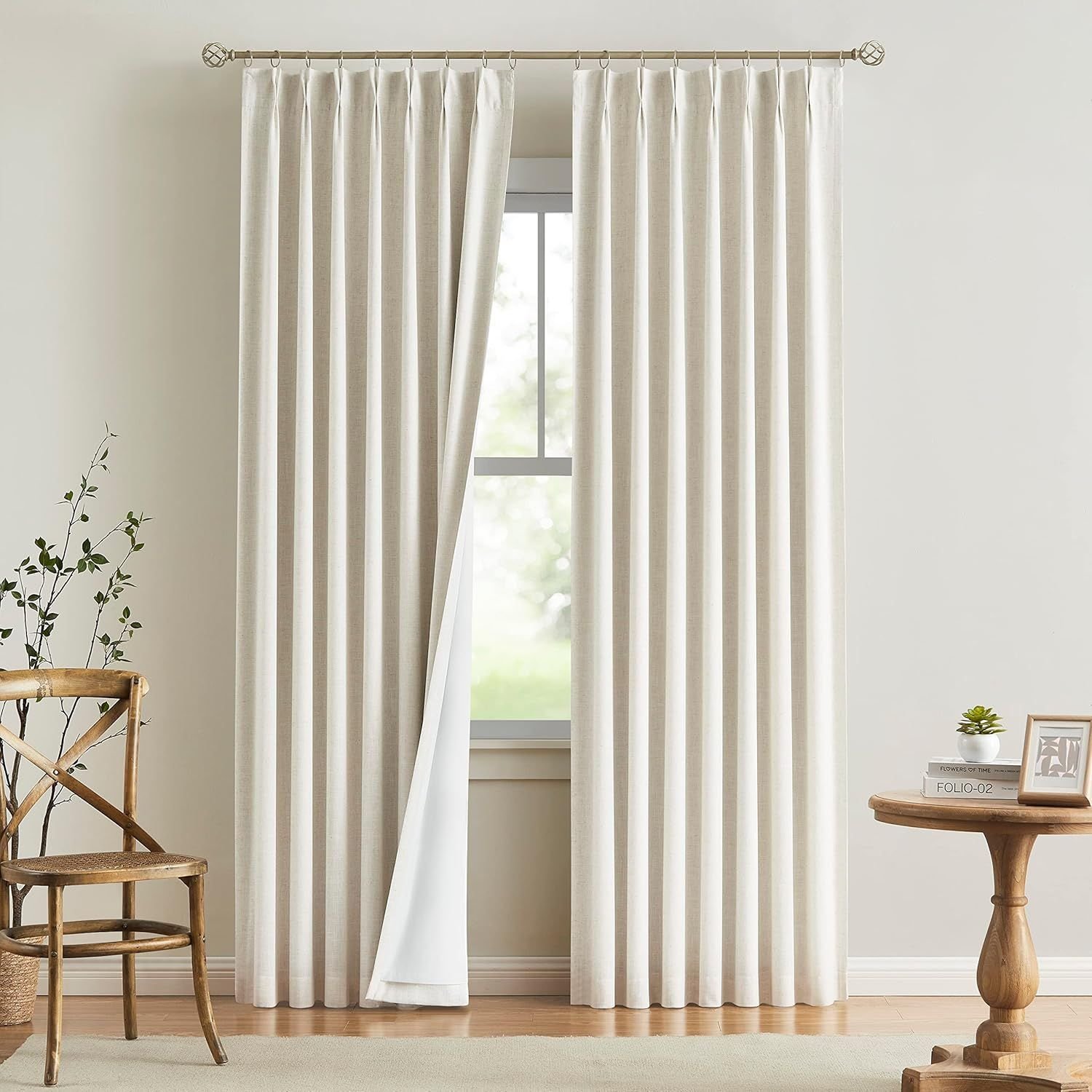 Ultimate Vision Home Blackout Insulated Curtain Review – 3-Way Energy-Efficient, Light-Blocking & Noise-Reducing Panels 1 Cream blackout insulated curtain with white liner on gold rod in neutral room with wood furniture and hardwood floors
