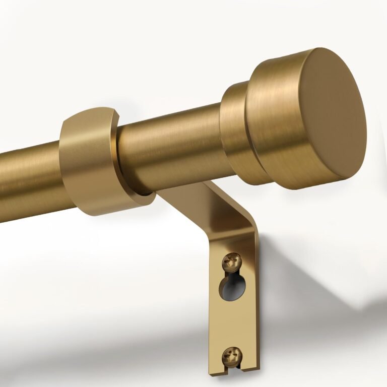 AIZESI curtain rod in brushed gold with cylindrical finials and wall bracket, shown with white curtains demonstrating multiple hanging styles