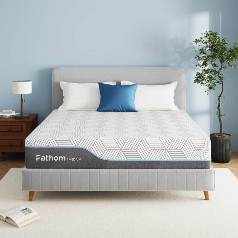 White FATHOM memory foam mattress medium firm with geometric pattern on light gray upholstered platform bed in modern bedroom