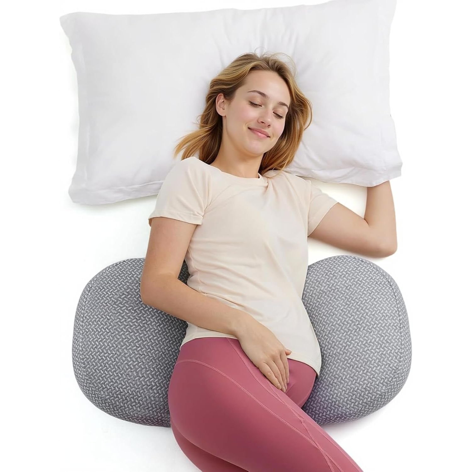 Best Momcozy Portable Pregnancy Pillow Review – 5 Benefits of Full-Body Maternity Support 1 Gray knit U-shaped pregnancy pillow supporting woman lying on white bedding with belly and back support
