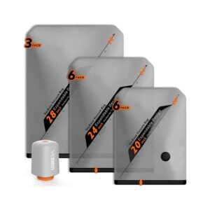 Set of grey wireless vacuum storage bags in three sizes with rechargeable white electric pump and orange measurement markings
