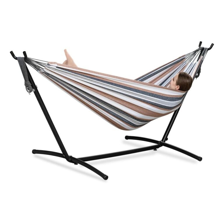 PNAEUT double hammock in brown, grey, and blue stripes on black metal stand with person relaxing comfortably