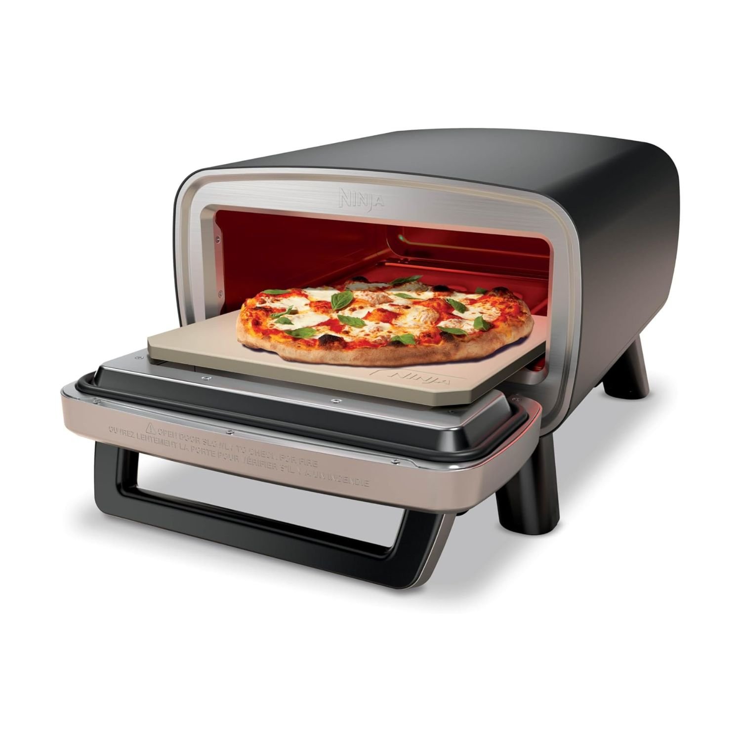 Ninja Artisan Outdoor Pizza Oven with ceramic stone showing freshly baked Margherita pizza with melted cheese and basil