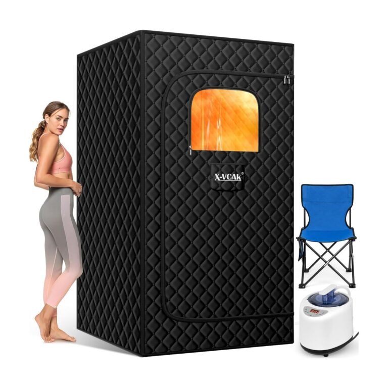 X-Vcak Steam Sauna Tent Review – Ultimate Portable Home Spa with 9 Heat Levels 8 X-Vcak steam sauna tent in black quilted design with orange steam glow window, white steam generator, blue folding chair, and woman using the portable home spa