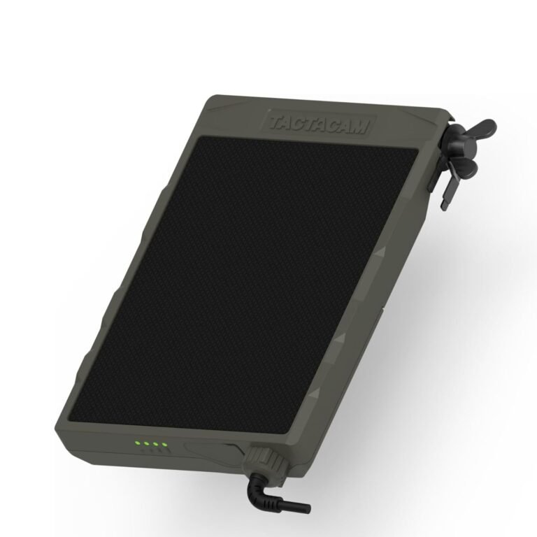 Tactacam Defend Security Camera Review – Powerful 4K Cellular Camera with 100ft IR Flash (No WiFi) 4 Olive green Tactacam Defend security camera with solar panel and LED indicators, mounted on tree in outdoor setting for remote monitoring