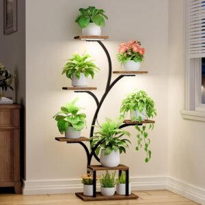 BACEKOLL 7-Tier Indoor Plant Stand with LED grow lights displaying green plants and pink flowers in white pots on wooden shelves